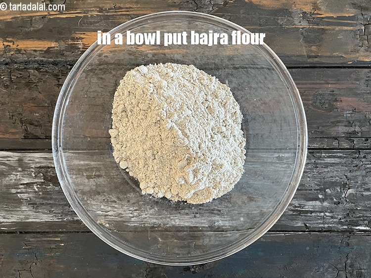 Step 4 – In a bowl put&nbsp;<meta charset="UTF-8" />1 cup&nbsp;<a href="glossary-bajra-flour-bajra-ka-atta-bajre-ka-atta-176i">bajra (black millet) flour</a>.