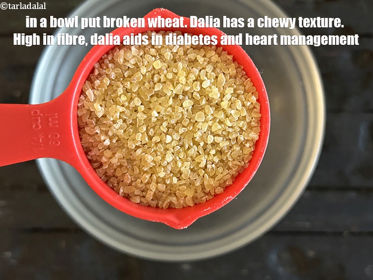 Step 32 – In a bowl put&nbsp;<!--%3Cmeta%20charset%3D%22UTF-8%22%20%2F%3E-->1/4 cup&nbsp;<a href="glossary-broken-wheat-dalia-bulgur-wheat-lapsi-fada-426i">broken wheat (dalia)</a>.&nbsp;Broken wheat has a chewy texture, which adds …