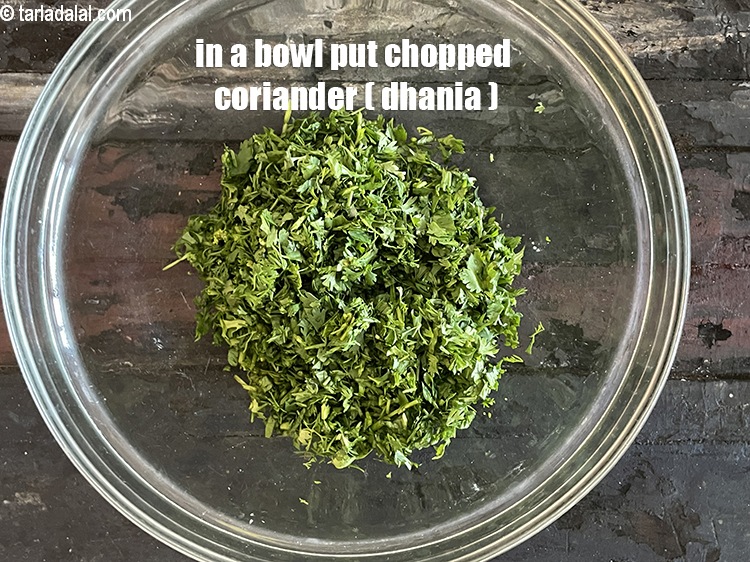 Step 4 – <meta charset="UTF-8" /> In a bowl put&nbsp;<meta charset="UTF-8" />1/2 cup&nbsp;<a href="glossary-chopped-coriander-783i">chopped coriander (dhania)</a>.