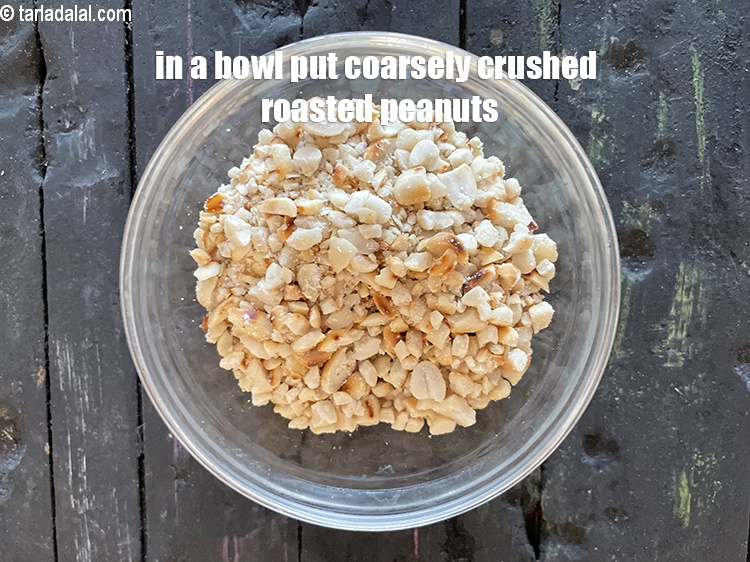 Step 15 – In a bowl put&nbsp;<meta charset="UTF-8" />1/2 cup&nbsp;coarsely&nbsp;<a href="glossary-roasted-and-crushed-peanuts-1817i">crushed roasted peanuts</a>.