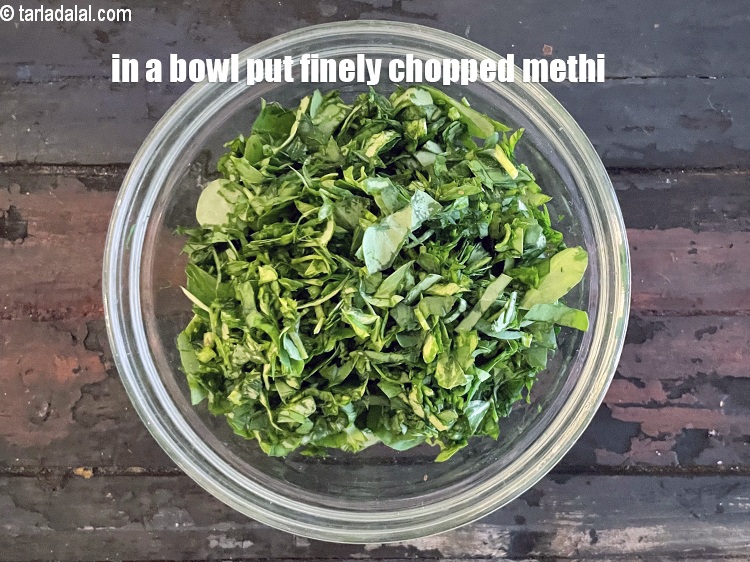 Step 3 – In a bowl put&nbsp;<meta charset="UTF-8" />3/4 cup&nbsp;finely&nbsp;<a href="glossary-chopped-fenugreek-811i">chopped fenugreek (methi)</a>.