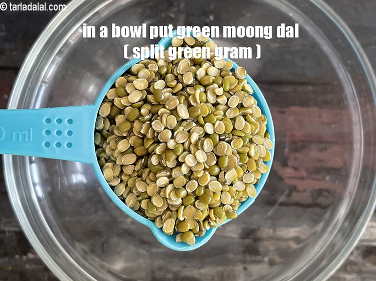 Step 3 – In a bowl put&nbsp;<meta charset="UTF-8" />1/2 cup&nbsp;<a href="glossary-green-moong-dal-split-green-gram-hari-mung-dal-522i">green moong dal (split green gram)</a>.