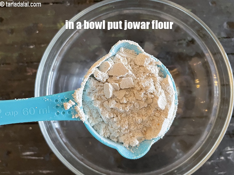 Step 6 – in a bowl put&nbsp;<meta charset="UTF-8" />1/2 cup&nbsp;<a href="glossary-jowar-flour-jowar-ka-atta-white-millet-flour-sorghum-flour-483i">jowar (white millet) flour</a>.