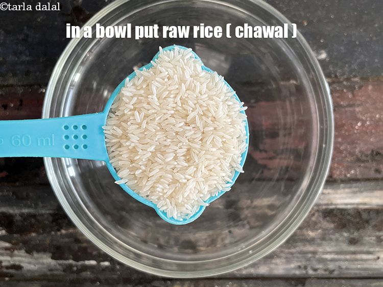 Step 4 – In a deep bowl put&nbsp;<meta charset="UTF-8" />1 cup&nbsp;raw&nbsp;<a href="glossary-rice-chawal-533i">rice (chawal)</a>.