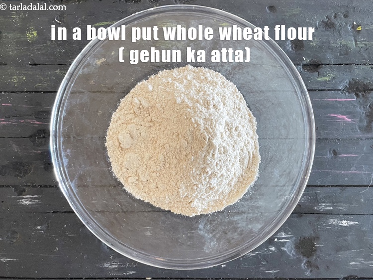 Step 3 – In a deep bowl put&nbsp;<meta charset="UTF-8" />1 cup&nbsp;<a href="glossary-whole-wheat-flour-gehun-ka-atta-gehun-ka-aata-429i">whole wheat flour (gehun ka atta)</a>.