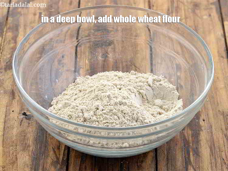Step 3 – To make <strong>thecha laccha paratha</strong>, in a deep bowl, 2 cups whole wheat flour.