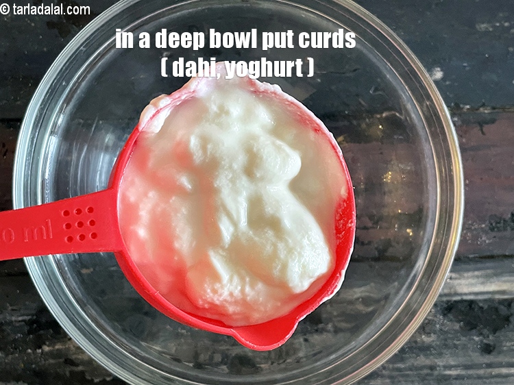 Step 5 – In a deep bowl put&nbsp;<meta charset="UTF-8" />1 cup&nbsp;<a href="glossary-curd-dahi-yogurt-yoghurt-383i">curds (dahi)</a>.