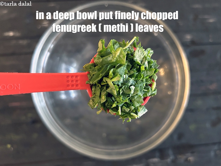 Step 3 – In a deep bowl put&nbsp;<meta charset="UTF-8" />2 tbsp&nbsp;finely&nbsp;<a href="glossary-chopped-fenugreek-811i">chopped fenugreek (methi)</a>&nbsp;leaves.