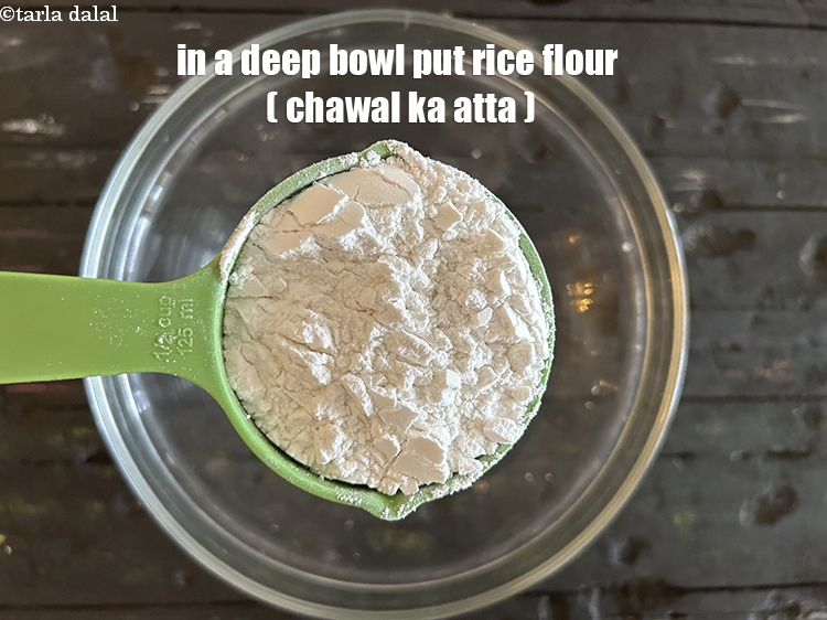 Step 4 – In a bowl put&nbsp;<meta charset="UTF-8" />1/2 cup&nbsp;<a href="glossary-rice-flour-chawal-ka-atta-534i">rice flour (chawal ka atta)</a>.