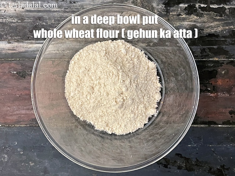 Step 12 – In a deep bowl put&nbsp;<meta charset="UTF-8" />3/4 cup&nbsp;<a href="glossary-whole-wheat-flour-gehun-ka-atta-gehun-ka-aata-429i">whole wheat flour (gehun ka atta)</a>.
