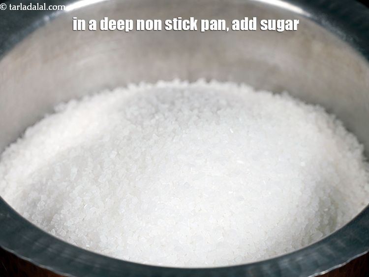 Step 3 – In a deep non-stick pan, add 1 cup sugar.