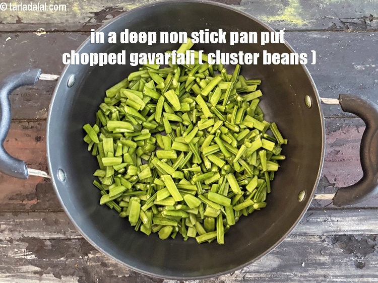 Step 8 – In a deep non stick pan put&nbsp;<meta charset="UTF-8" />2 cups&nbsp;<a href="glossary-chopped-cluster-beans-822i">chopped cluster beans (gavarfali)</a>.