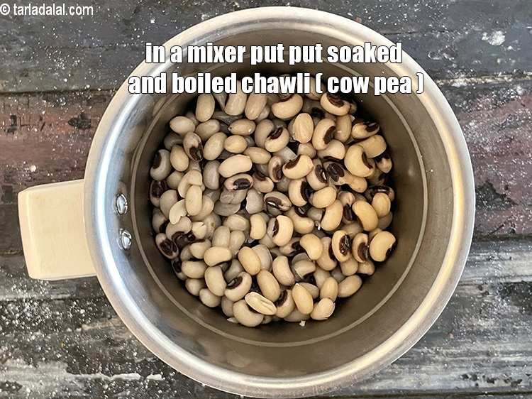 Step 9 – In a mixer put&nbsp;<meta charset="UTF-8" />1 1/2 cups&nbsp;soaked and&nbsp;<a href="glossary-boiled-chawli-1784i">boiled chawli (cow pea / lobhia)</a>.