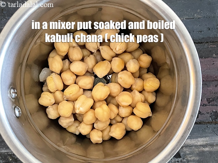 Step 18 – In a mixer put&nbsp;<meta charset="UTF-8" />1 cup&nbsp;soaked and&nbsp;<a href="glossary-boiled-kabuli-chana-1354i">boiled kabuli chana (white chick peas)</a>.