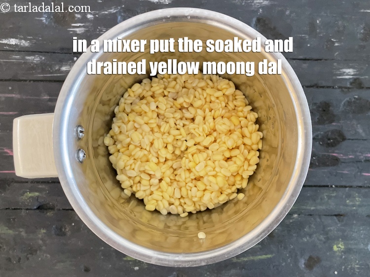 Step 12 – In a mixer put the soaked and drained yellow moong dal.