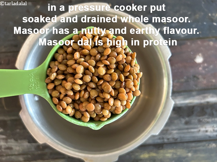 Step 33 – <meta charset="UTF-8" /> in a pressure cooker put&nbsp;3/4 cup&nbsp;<a href="glossary-masoor-whole-red-lentil-kala-masoor-301i">soaked and drained whole masoor (whole …