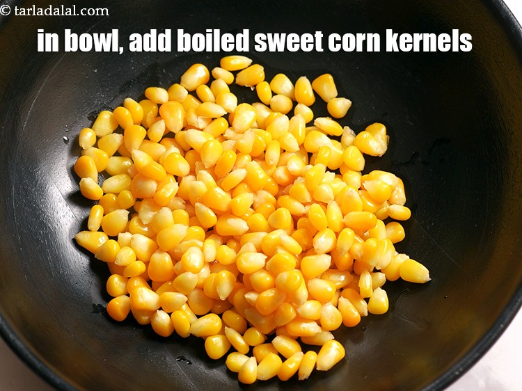 Step 12 – In a deep bowl, add 1 cup <a href="https://www.tarladalal.com/glossary-boiled-sweet-corn-kernels-153i">boiled sweet corn kernels (makai ke dane)</a>.