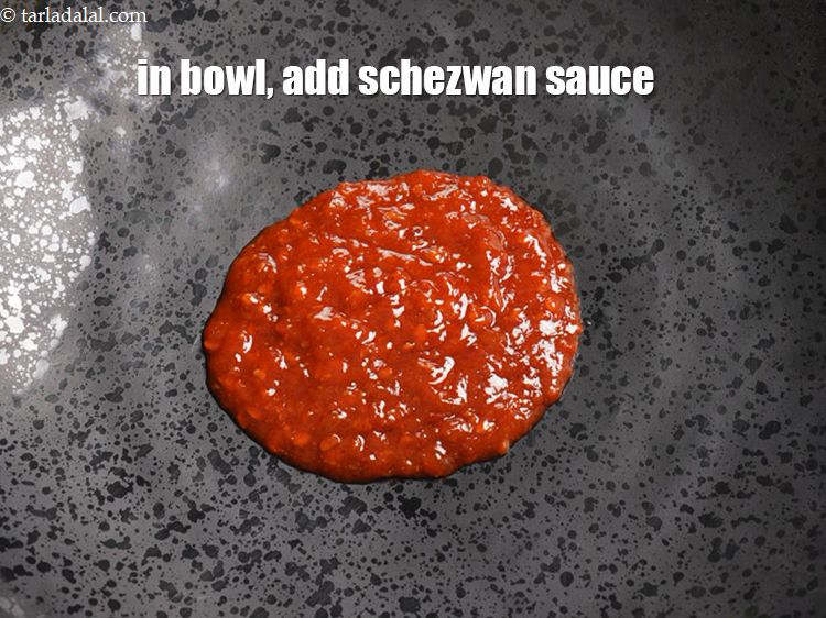 Step 3 – To make <strong>schezwan paneer toast</strong>, In a bowl, add 3 tbsp <a href="https://www.tarladalal.com/glossary-schezwan-sauce-schezuan-sauce-1872i">schezwan sauce</a>.