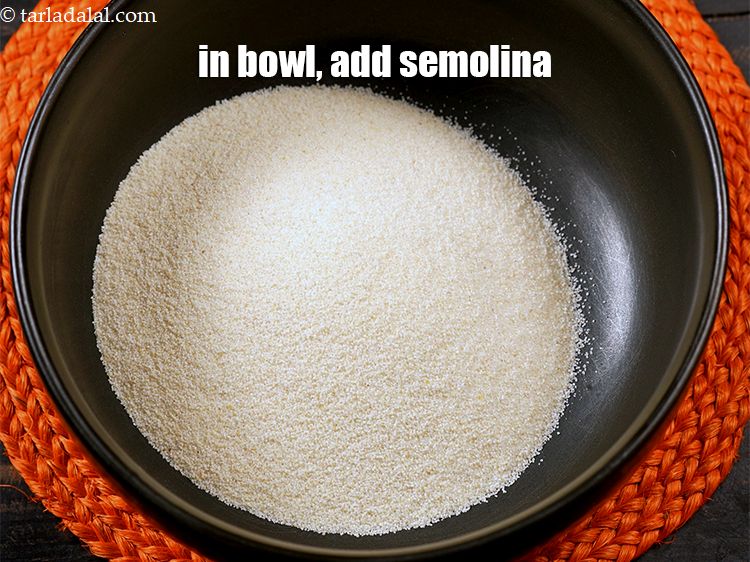 Step 4 – In a deep bowl, add 1 cup <a href="https://www.tarladalal.com/glossary-semolina-sooji-rava-rawa-603i">semolina (rava / sooji)</a>.&nbsp;