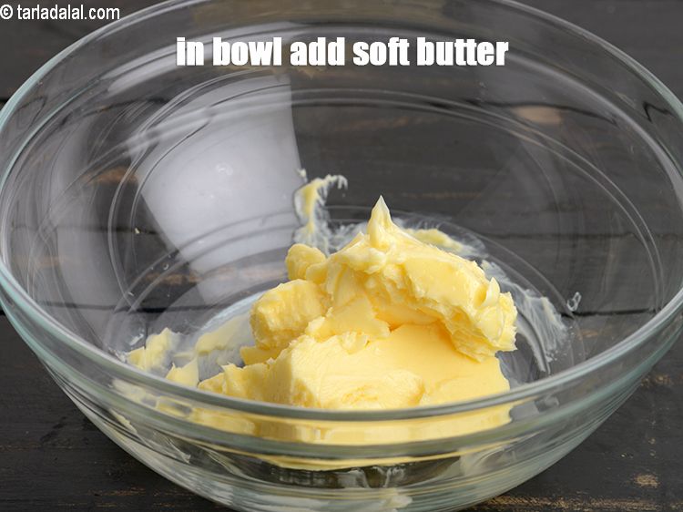 Step 3 – To make<strong> jeera cookies</strong>, in a bowl add &frac12; cup&nbsp;<a href="https://www.tarladalal.com/glossary-soft-butter-naram-makhan-1942i">soft butter</a>.