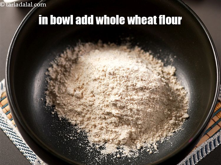 Step 9 – To make <strong>malpua recipe</strong>, in a deep bowl add &frac34; cup whole wheat flour.