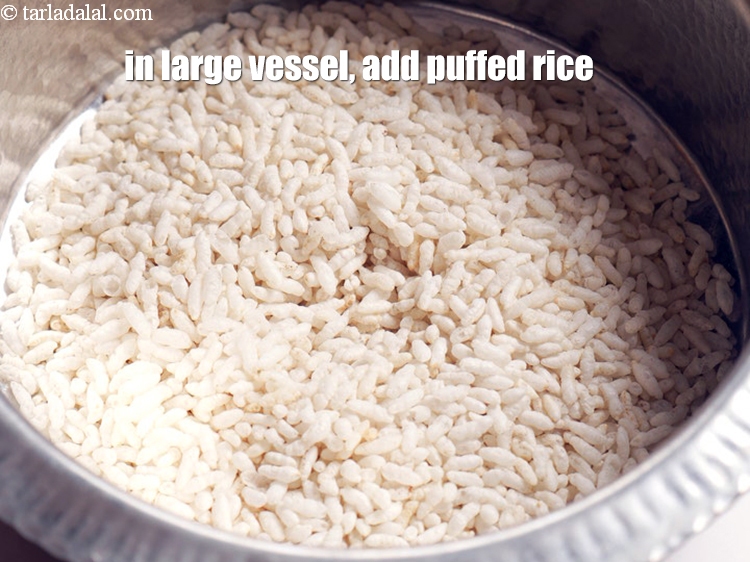 Step 4 – To make <strong>jhal muri</strong>, in a large vessel, 4 cups <a href="https://www.tarladalal.com/glossary-puffed-rice-kurmura-murmura-mamra-537i">puffed rice (kurmura)</a>.
