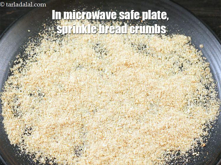 Step 3 – To make <strong>cheese powder</strong>, In a microwave safe plate, sprinkle 2 tbsp of <a href="https://www.tarladalal.com/glossary-bread-crumbs-breadcrumbs-222i">bread …