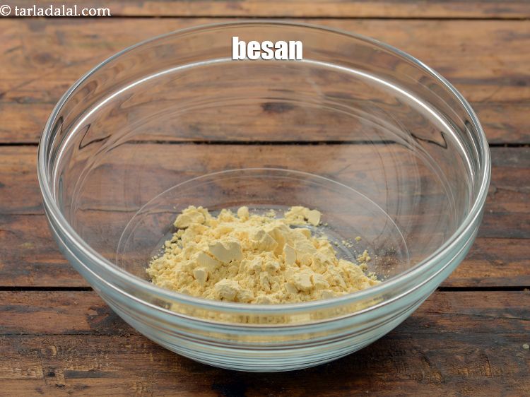 Step 13 – To make curd mixture, take a big bowl, add the besan. This gives a good …