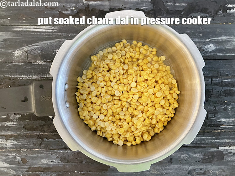 Step 10 – <meta charset="UTF-8" /> In a pressure cooker put washed and soaked&nbsp;<a href="glossary-chana-dal-split-bengal-gram-285i">chana dal (split bengal …