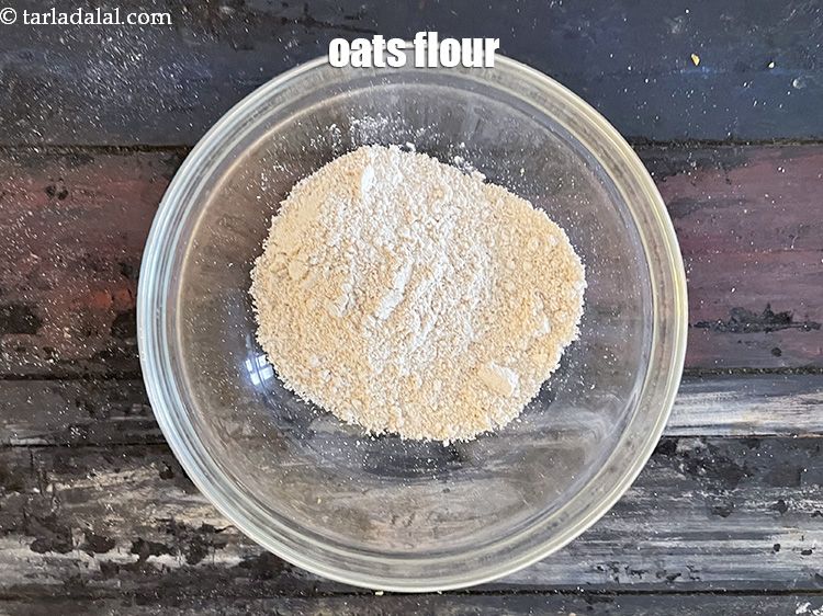 Step 7 – To make <strong>dough for oats khakhra</strong>, in a bowl put&nbsp;1/2 cup&nbsp;quick cooking rolled&nbsp;<a href="glossary-oats-flour-oats-atta-2201i">oats flour</a>.
