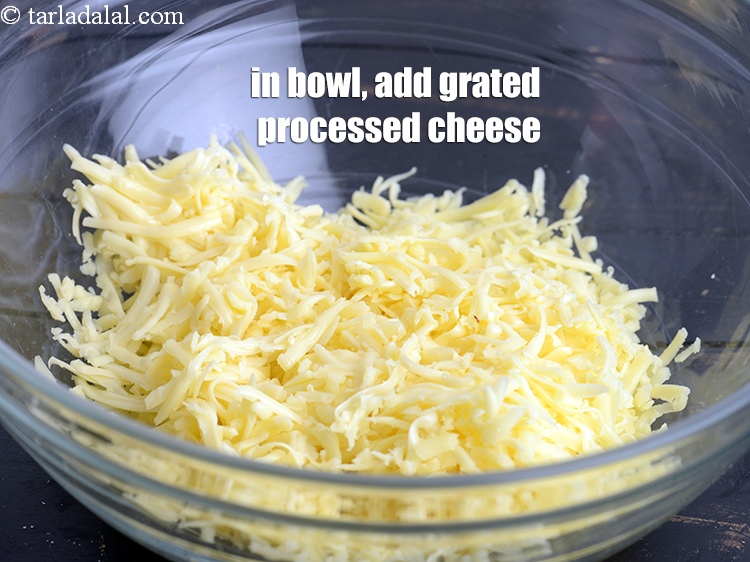 Step 4 – In a deep bowl, add 1 cup <a href="https://www.tarladalal.com/glossary-grated-processed-cheese-868i">grated processed cheese</a>.