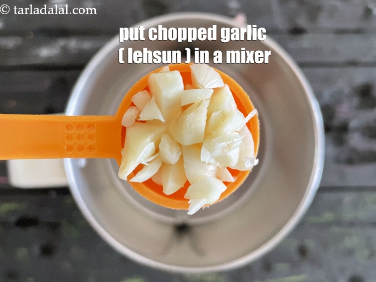 Step 11 – In a mixer put&nbsp;<meta charset="UTF-8" />2 tsp&nbsp;<a href="glossary-chopped-garlic-790i">chopped garlic (lehsun)</a>. &nbsp;