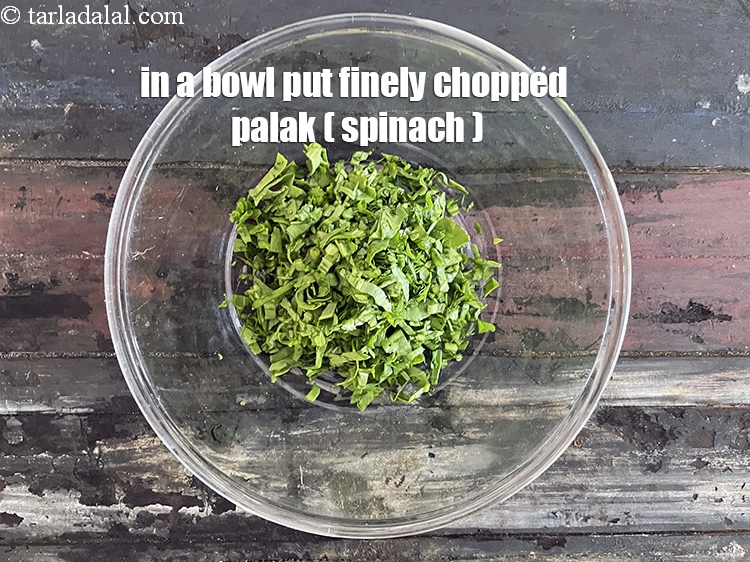 Step 5 – In a deep bowl put&nbsp;<meta charset="UTF-8" />1/2 cup&nbsp;finely&nbsp;<a href="glossary-chopped-spinach-780i">chopped spinach (palak)</a>.