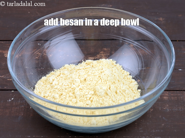 Step 4 – For the batter, add 2 cup <a href="https://www.tarladalal.com/glossary-besan-chana-dal-flour-bengal-gram-flour-952i">besan (bengal gram flour)</a>&nbsp;in a deep bowl.&nbsp;