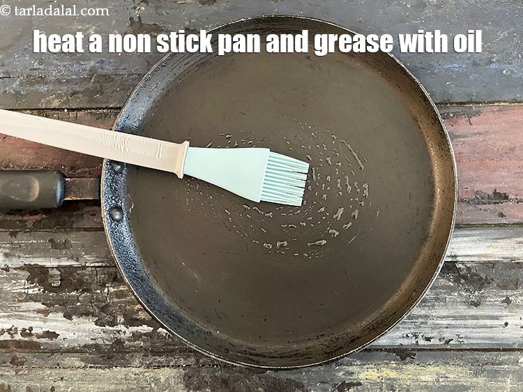 Step 16 – To make <strong>nachni pancake&nbsp;recipe | ragi&nbsp;pancake | healthy red millet pancake | nachni chilla |&nbsp;</strong>heat …