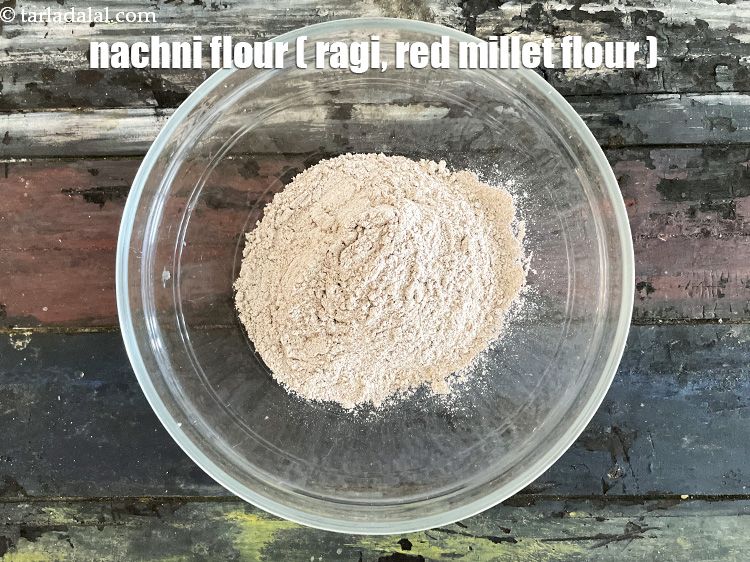 Step 5 – In a bowl put&nbsp;<meta charset="UTF-8" />1 cup&nbsp;<a href="glossary-ragi-flour-nachni-flour-nachni-ka-atta-red-millet-flour-1115i">ragi (nachni / red millet) flour</a>.