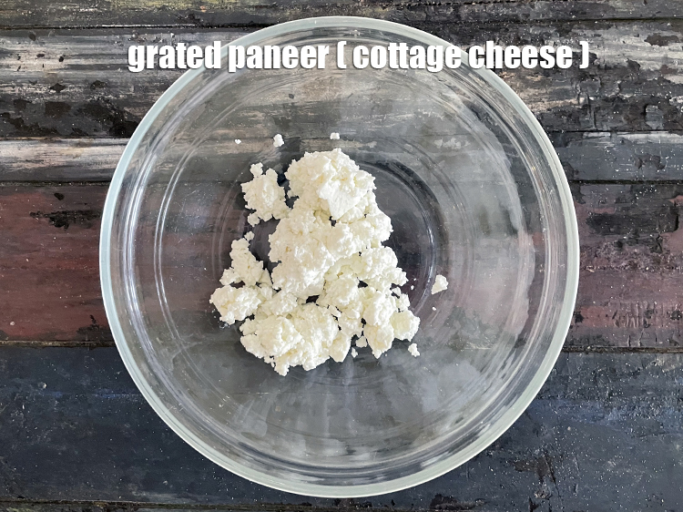 Step 5 – In a deep bowl put&nbsp;<meta charset="UTF-8" />1/2 cup&nbsp;<a href="glossary-grated-panee-1003i">grated paneer (cottage cheese)</a>.