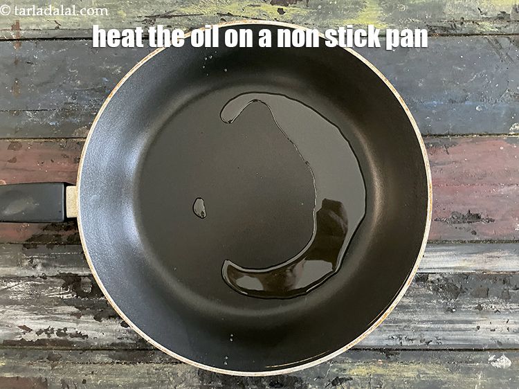 Step 21 – Heat 2 tsp oil in a non-stick pan.