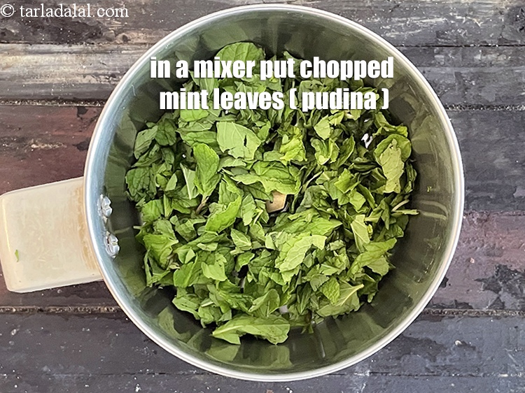 Step 3 – In a mixer put&nbsp;<meta charset="UTF-8" />1/4 cup&nbsp;<a href="glossary-chopped-mint-788i">chopped mint leaves (phudina)</a>.
