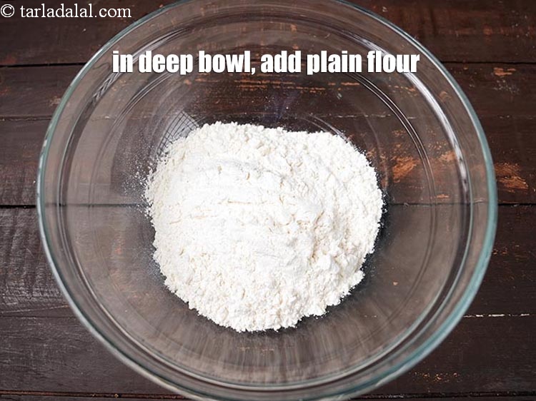 Step 3 – In a deep bowl, add &frac34; cup <a href="https://www.tarladalal.com/glossary-plain-flour-maida-188i">plain flour (maida)</a>.