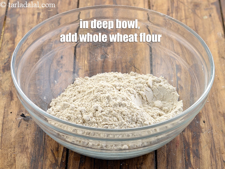 Step 4 – In a deep bowl, add 1 1/4 cups <a href="https://www.tarladalal.com/glossary-whole-wheat-flour-gehun-ka-atta-gehun-ka-aata-429i">whole wheat flour (gehun ka atta)</a>.
