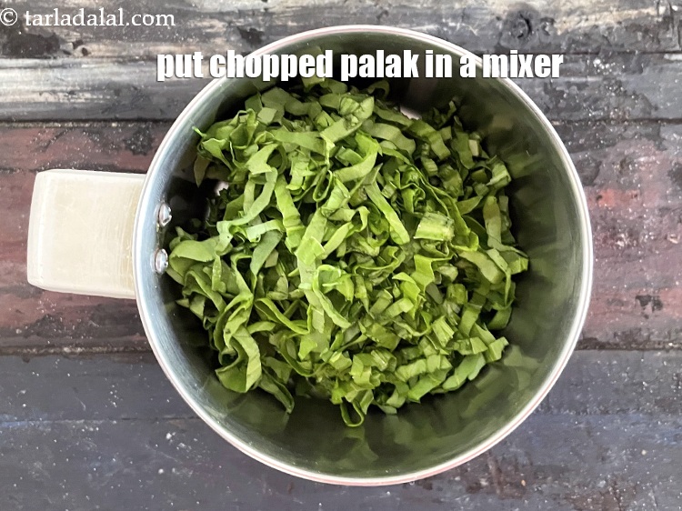 Step 5 – In a mixer put&nbsp;<meta charset="UTF-8" />1/2 cup&nbsp;<a href="glossary-chopped-spinach-780i">chopped spinach (palak)</a>.
