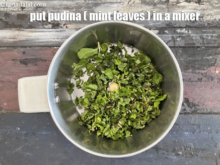 Step 14 – In a blender put&nbsp;<meta charset="UTF-8" />1/4 cup&nbsp;<a href="glossary-mint-leaves-pudina-phudina-521i">mint leaves (phudina)</a>.