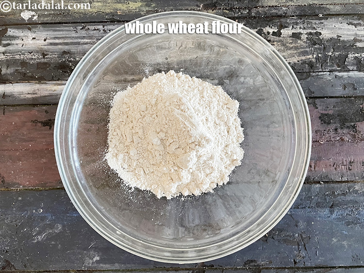 Step 3 – In a deep glass bowl put&nbsp;<meta charset="UTF-8" />1 cup&nbsp;<a href="glossary-whole-wheat-flour-gehun-ka-atta-gehun-ka-aata-429i">whole wheat flour (gehun ka atta)</a>.