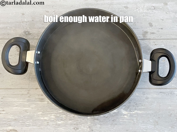 Step 5 – To make <strong>pink sauce pasta</strong>, boil enough water in a deep pan.