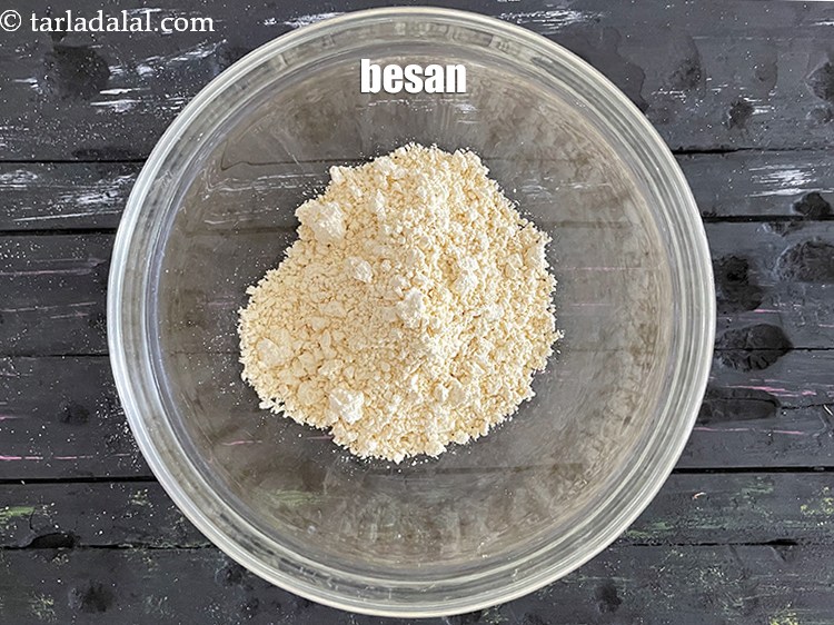 Step 4 – In a deep bowl put&nbsp;<meta charset="UTF-8" />5 tbsp&nbsp;<a href="glossary-besan-chana-dal-flour-bengal-gram-flour-952i">besan (bengal gram flour)</a>.