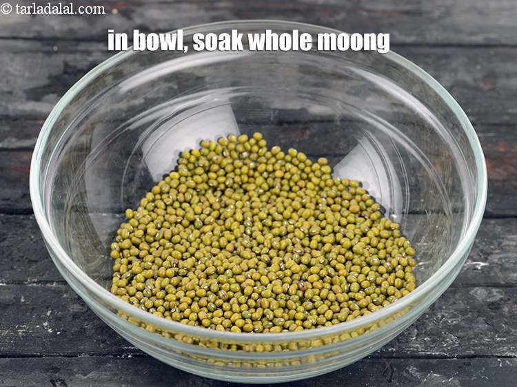 Step 3 – To make <strong>Pesarattu</strong>, in a big bowl, soak 1 cup whole <a href="https://www.tarladalal.com/glossary-mung-moong-moong-beans-whole-green-gram-821i">moong (whole green …