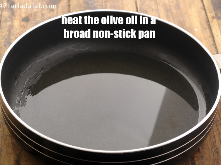 Step 2 – To make pizza sauce for <strong>bread pizza</strong>, heat the olive oil in a broad non-stick …