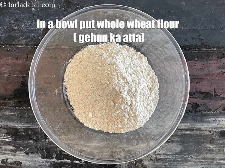 Step 10 – In a bowl put&nbsp;<meta charset="UTF-8" />1 cup&nbsp;<a href="glossary-whole-wheat-flour-gehun-ka-atta-gehun-ka-aata-429i">whole wheat flour (gehun ka atta)</a>.