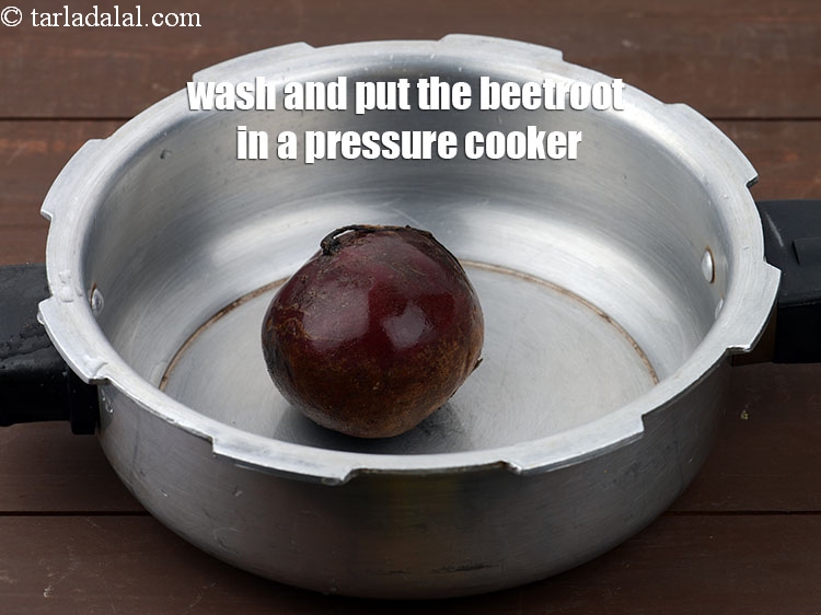 Step 3 – Wash and put 1 big&nbsp;<a href="https://www.tarladalal.com/glossary-beetroot-chukandar-201i">beetroot</a> in a pressure cooker.